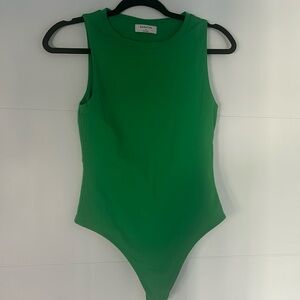 Babaton bodysuit. New with no tags- M